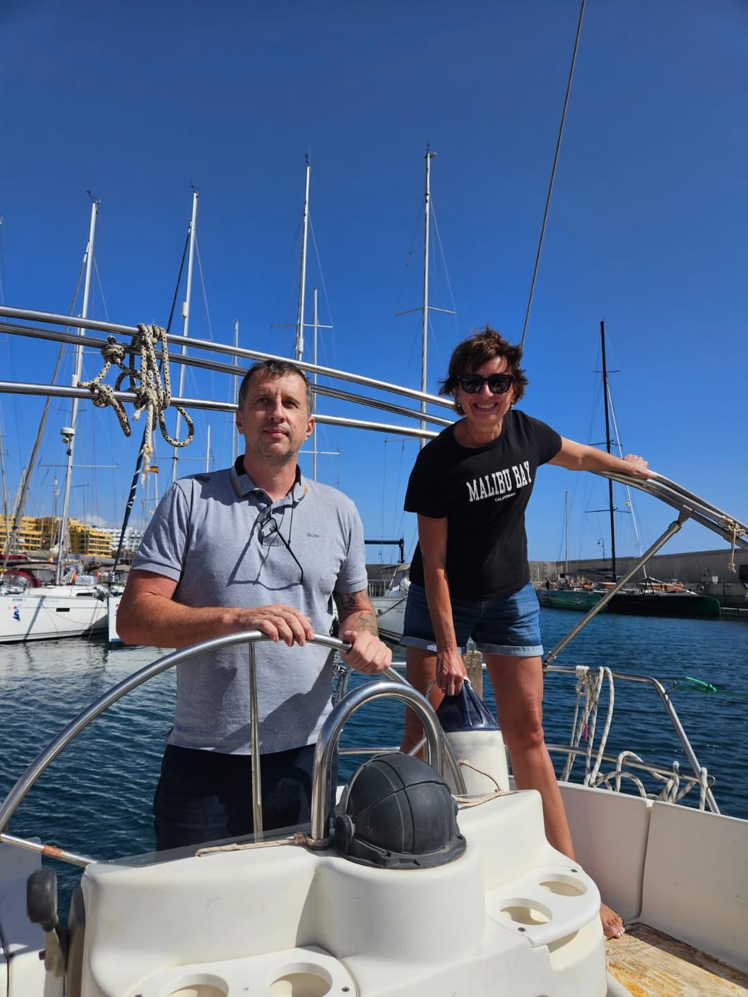 ISSA sailing instructor with student at Puerto Colón marina, Costa Adeje